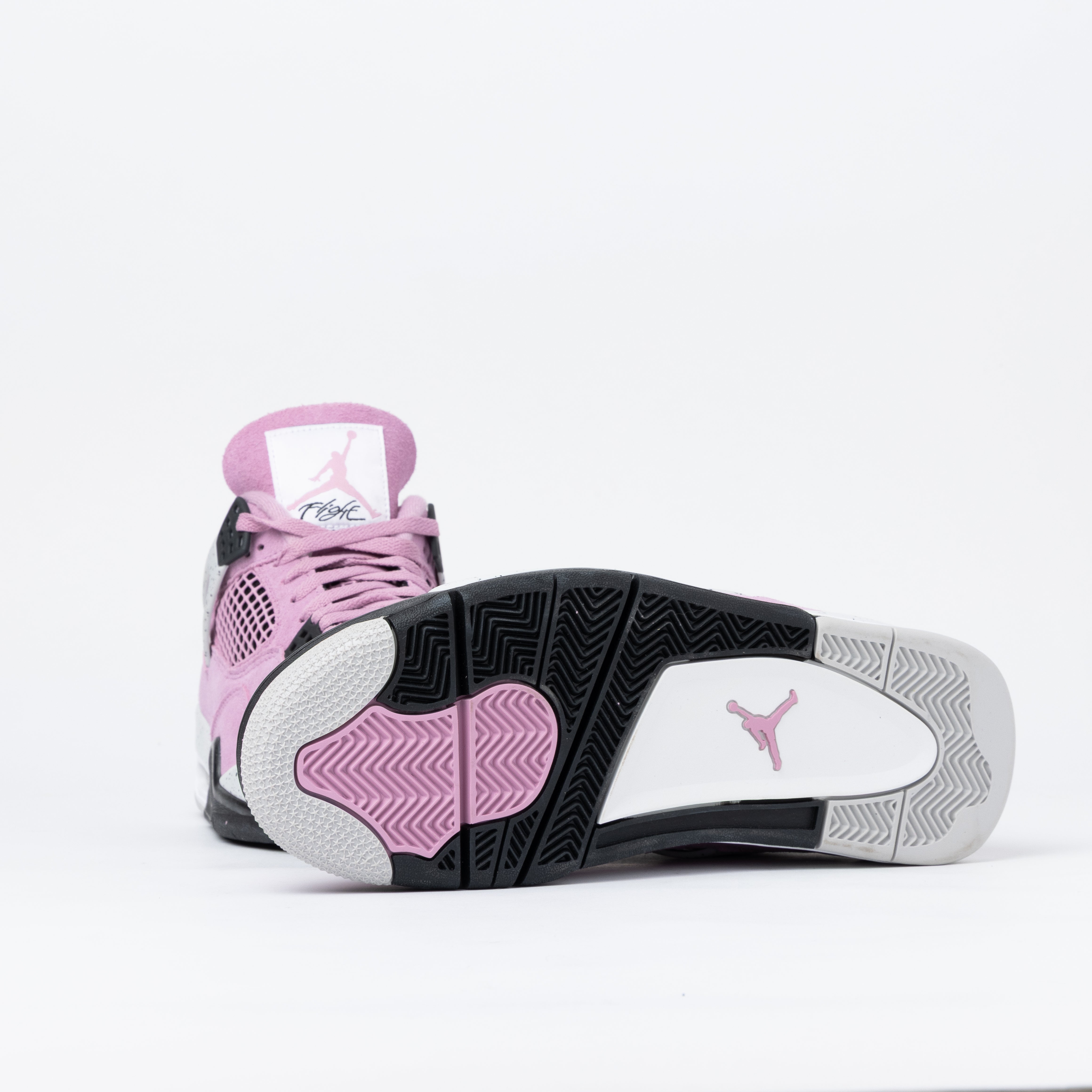 Jordan 4 Retro Orchid (talla de mujer)