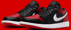 JORDAN 1 LOW BLACK AND RED